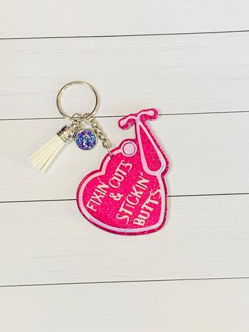 Fixin’ Cuts and Stickin’ Butts Keychain